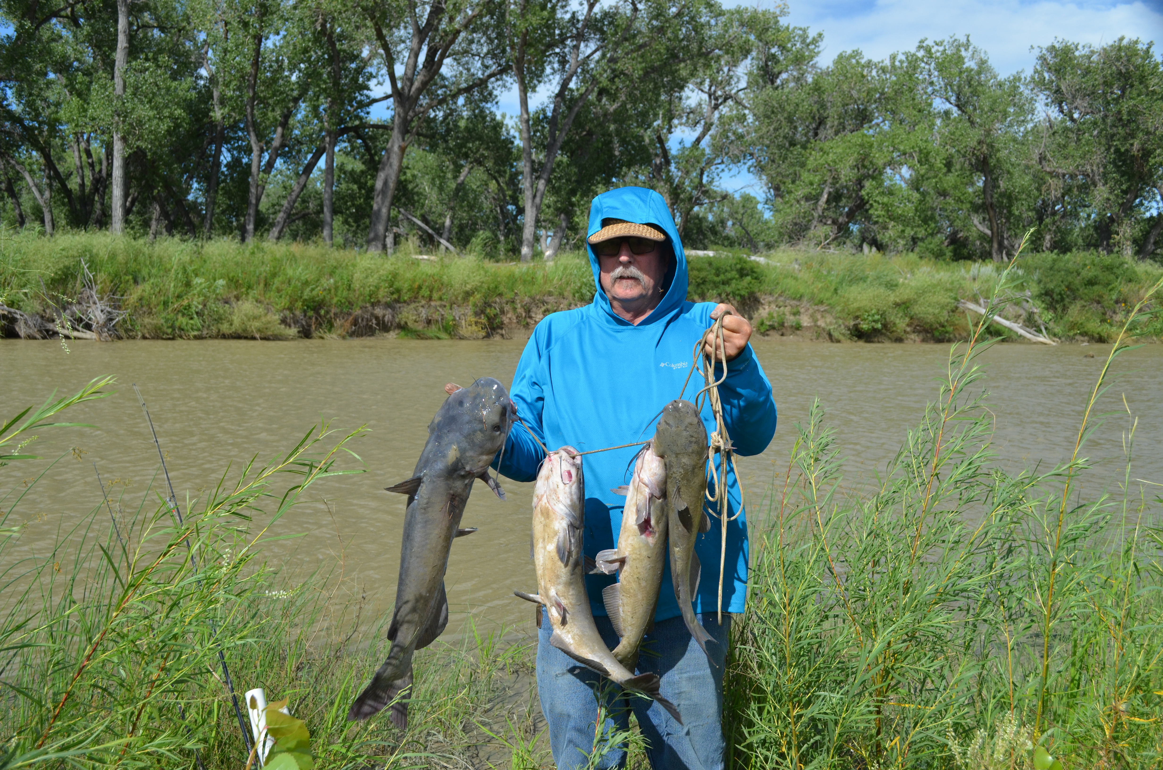 Veteran with successful fishing catch